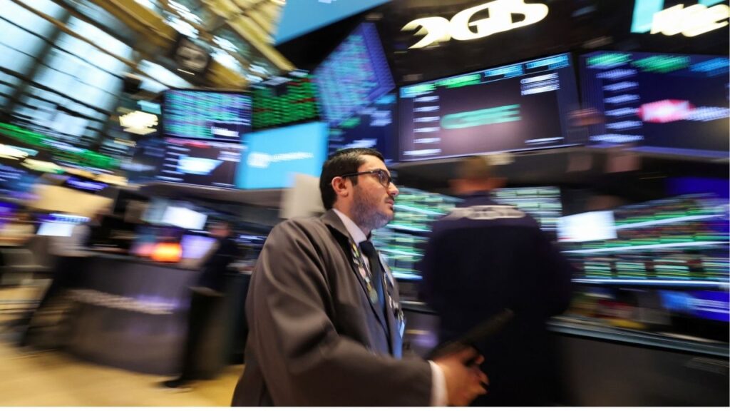 A trader walks, while working on the floor at the New York Stock Exchange (NYSE) in New York City, U.S., April 22, 2025. (REUTERS/Brendan McDermid/File Photo)